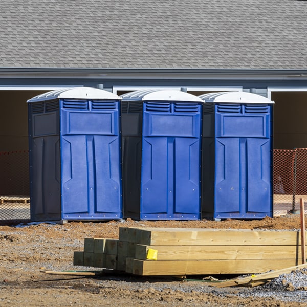 what is the cost difference between standard and deluxe portable toilet rentals in Dugger Indiana